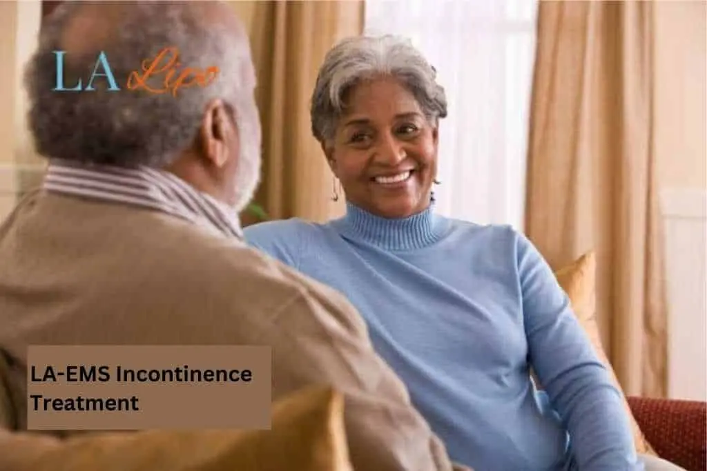 Couple sat smiling at each other - LA-EMS treatment Market Harborough